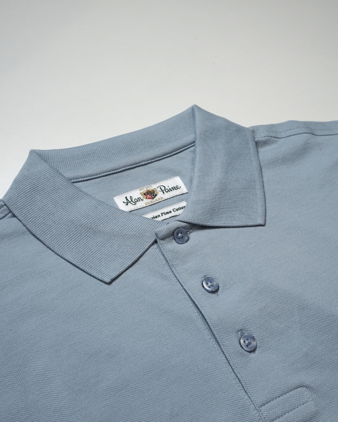 Reed Long Sleeve Polo In Light Blue.